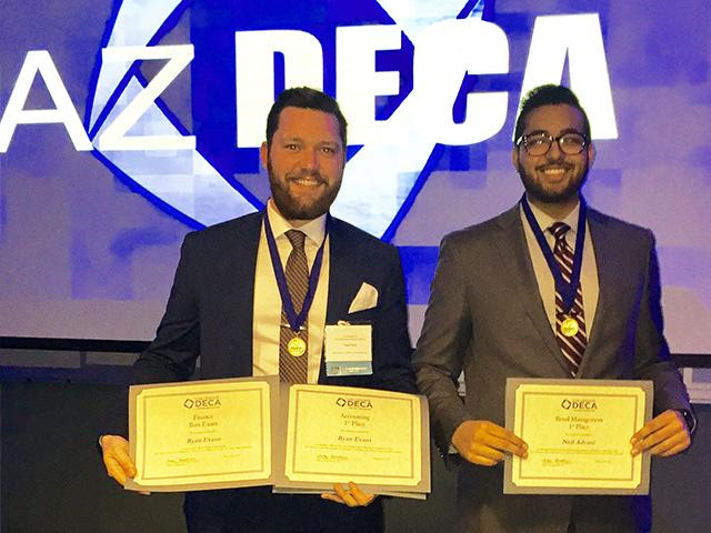 Ryan Evans (left) won first place in accounting while Neil Advani earned top honors in retail management.                                               
