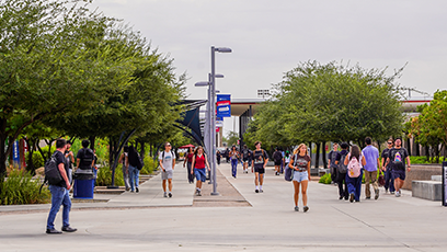 Image of Mesa Community College campus featuring students walking and interacting.