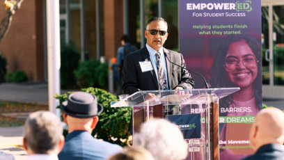 Chancellor Dr. Steven R. Gonzales is giving a speech at the launch of the EmpowerED for Student Success launch.