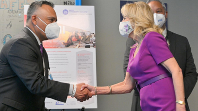 Dr. Steven R. Gonzales and First Lady Dr. Jill Biden shaking hands.