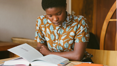 An image of a woman studying
