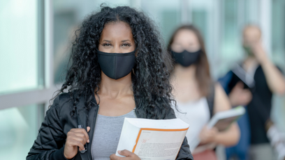Image of students waring masks indoors