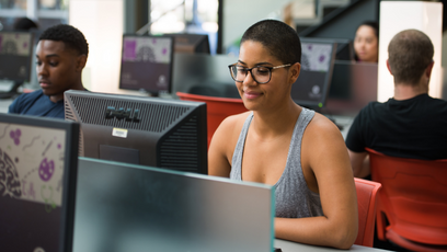 Woman sitting at computer