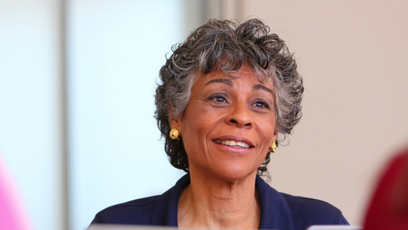 An image of a woman smiling