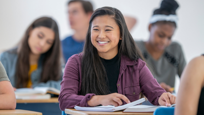 An image of a smiling high school student