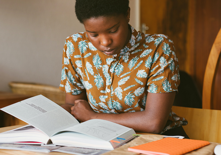 An image of a woman studying