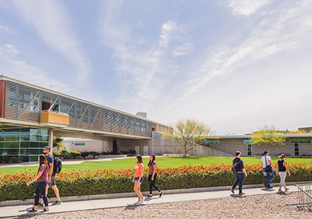 Image of students walking on a college campus
