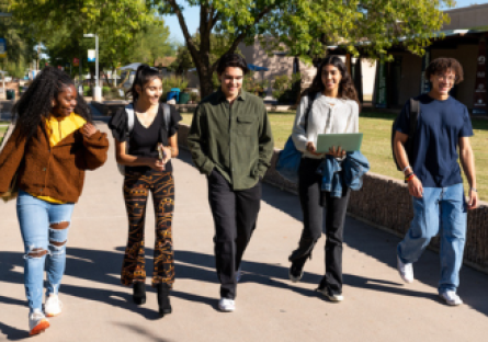 A group of students walking across the campus.