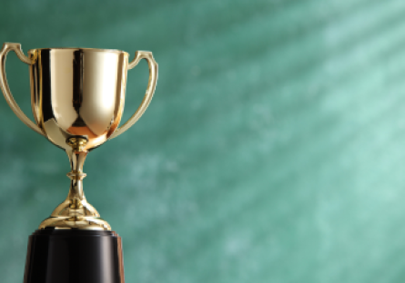 Green background with a gold trophy