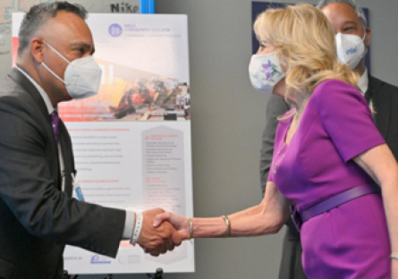 Dr. Steven R. Gonzales and First Lady Dr. Jill Biden shaking hands.