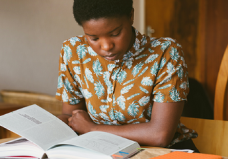 An image of a woman studying