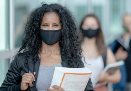 Image of students waring masks indoors