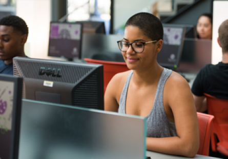 Woman sitting at computer