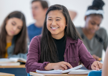 An image of a smiling high school student