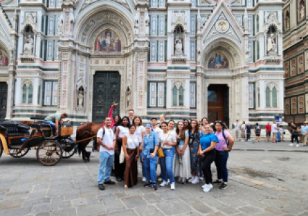 An image of a group of students in the study abroad program visiting the Duomo in Italy