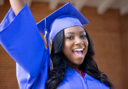 An image of a Maricopa Community Colleges female graduate wearing a graduation cap and gown