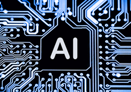 Image of a a computer chip and the letters AI
